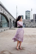 © Анна Антонова - beautiful woman talking on the phone in the street