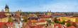 Panoramic view of Eger city, Hungary with red roofs and blue sky. Travel european town background