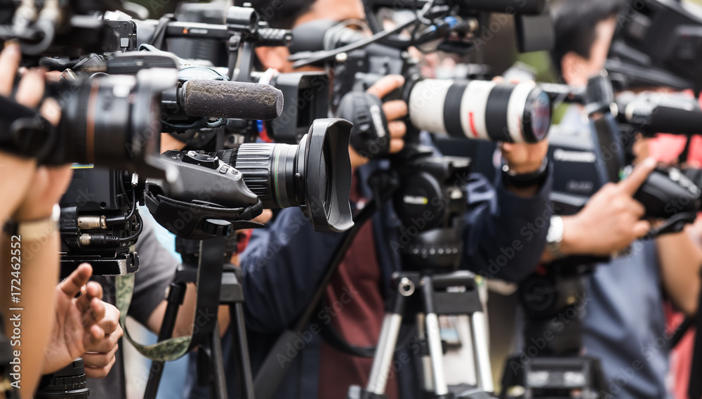 Two Camera Operator Machine Video camera operator working with his professional equipment Stock ...