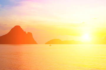 Wall Mural - bright colors at dawn on the beach at sunrise in the gulf of thailand.