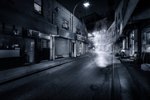 Moody Monochrome View Of Doyers Street By Night, In NYC Chinatown. The Bend Became Known As "the Bloody Angle" Because Of Numerous Gang Shootings.