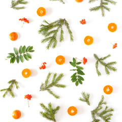 Wall Mural - Pattern of fir branches, tangerines in a cut and rowan. Top view, flat design. Christmas, New Year background.