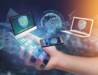 Poster - Security shield symbol over a network connection of different devices - Technology concept