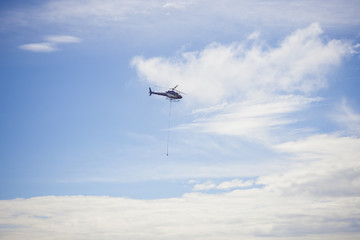 Sticker - helicopter carry cargo in the sky