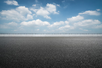 asphalt road and blue sky.