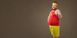 © Studio Romantic - A fat man with a beard in a tracksuit. Comical in sport.