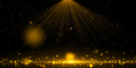 Wall Mural - Stage lights with sprinkle gold dust on a black background with copy space.	