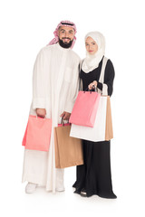 Wall Mural - muslim couple with shopping bags