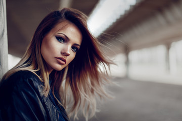 Wall Mural - Beautiful young blonde with long hair posing