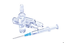Medical Conception: Ampules And Syringe With Transparent Vaccine