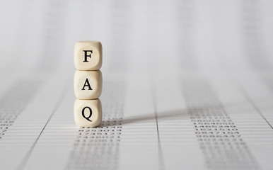 Poster - Word FAQ made with wood building blocks