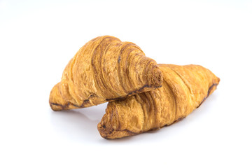 two croissant on white background