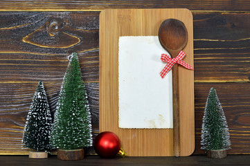 Christmas  recipe card on wooden background with copy space