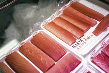 Small Pieces Of Filleted Tuna With  Japanese Price Tags