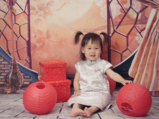 Wall Mural - Asian baby girl celebrate mid-Autumn festival