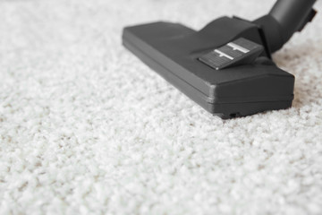 Wall Mural - Vacuum cleaner on carpet