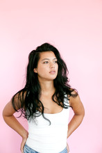 Attractive Young Woman With Pink Background