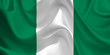 Waving flag of the Nigeria. Nigerian Flag in the Wind. Nigerian National mark. Waving Nigeria Flag. Nigeria Flag Flowing.