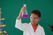 © wavebreak3 - Attentive schoolboy doing a chemical experiment in laboratory