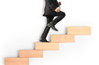 business person stepping up  toy staircase