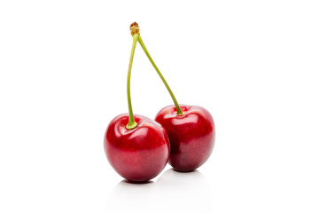 Wall Mural - Two Cherry on a peduncle isolated on a white background