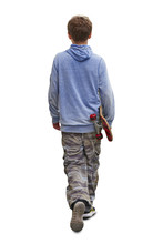 Young Boy Teenager Walking With His Skateboard Isolated