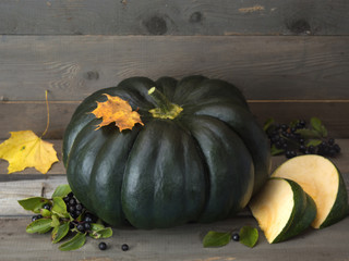 Pumpkin on a wooden table. 