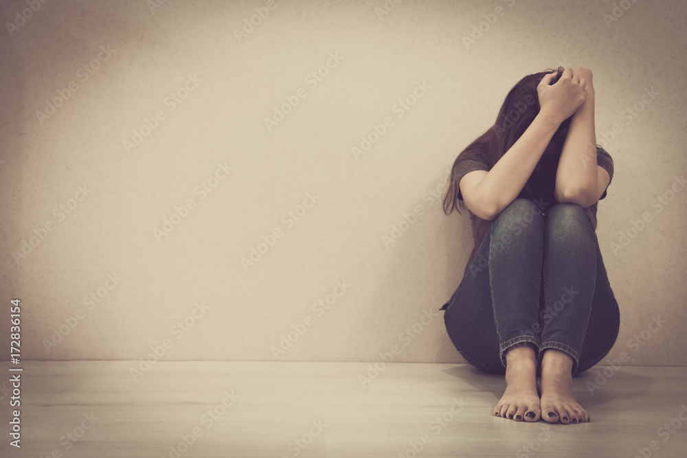 sad woman hug her knee and cry. The depression woman sit on the floor ...