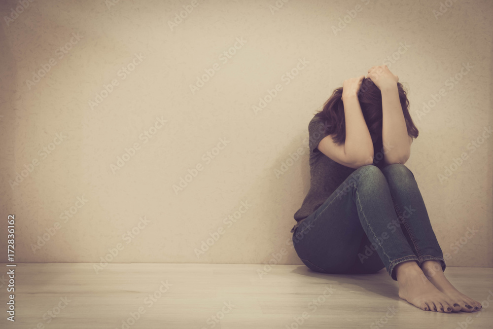 sad woman hug her knee and cry. The depression woman sit on the floor ...