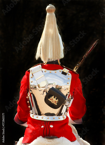 Fotografía Back View of a Grenadier guard in uniform with brass armour and feather helmet