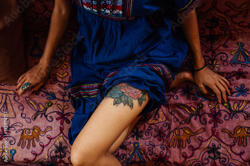 Thai Woman Revealing Tattoo On Her Thigh Thai Woman Revealing Tattoo On Her Thigh