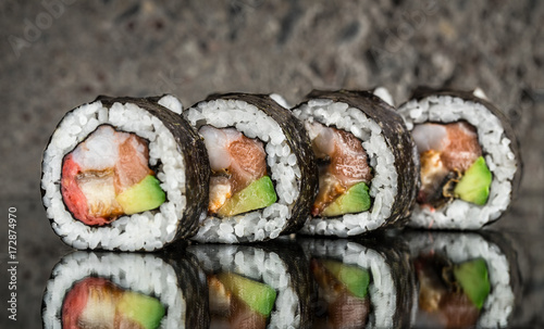 Fotomural Sushi roll with salmon, shrimps and avocado