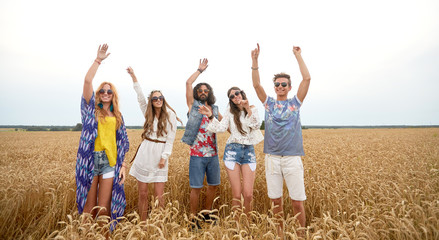 Sticker - happy young hippie friends dancing on cereal field