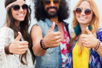 Sticker - happy young hippie friends showing thumbs up