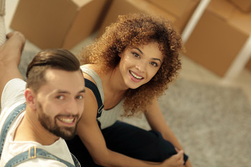 Wall Mural - Happy young couple in a new apartment.