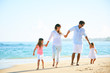 © EpicStockMedia - Happy Family on the Beach