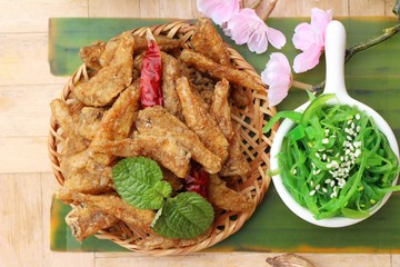 Sticker - Seaweed salad with fried fish is delicious