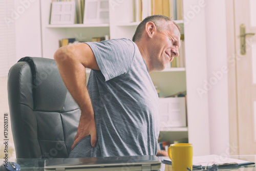 Fotomural Man suffering from low back pain