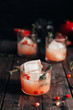 © natasamandic/Stocksy - Pomegranate cocktail with thyme
