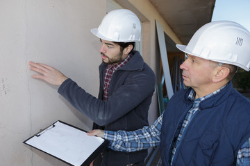 inspecting the wall condition