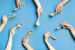 © Carles Rodrigo Monzo/Stocksy - Composition with hands and spoon