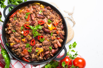 Wall Mural - Chili con carne on white. Traditional mexican food. Top view.