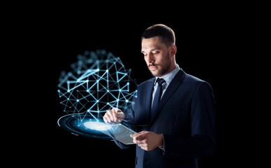 Wall Mural - businessman with tablet pc and low poly projection
