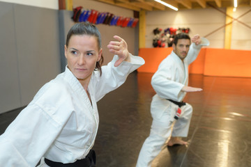 two martial arts fighters practicing combat sport