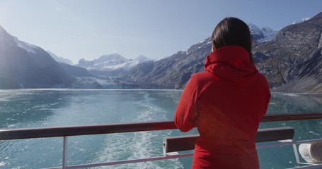 Wall Mural - glacier bay alaska cruise ship passenger looking at glacier in glacier bay national park, usa. woman