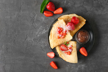 Poster - Delicious pancakes with chocolate and strawberry on table