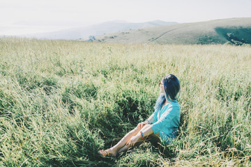 Poster - Woman resting on summer meadow.