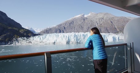 Wall Mural - alaska cruise ship passenger on balcony looking at glacier in glacier bay national park, usa. woman 