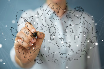 Leinwandbilder - Businesswoman drawing a sketch lightbulb with a pen