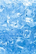 Background With Ice Cubes In Blue Light